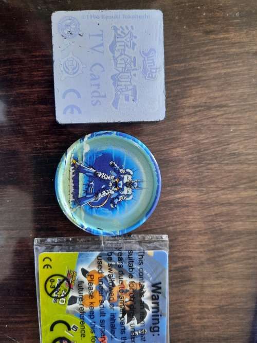 Tin metal Tazos 283in total plus 114 simba tv cards yu -gi -oh