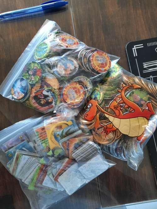 Tin metal Tazos 283in total plus 114 simba tv cards yu -gi -oh