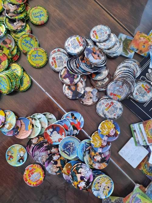 Tin metal Tazos 283in total plus 114 simba tv cards yu -gi -oh