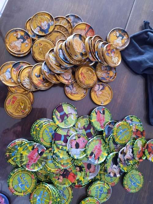Tin metal Tazos 283in total plus 114 simba tv cards yu -gi -oh