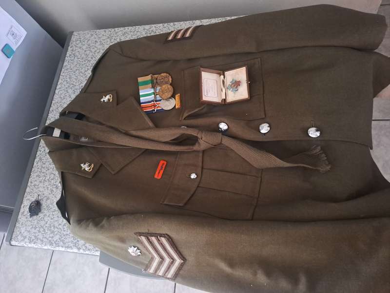 Vintage military medals and clothing ect