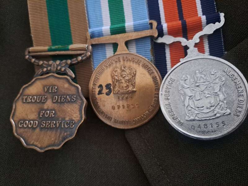 Vintage military medals and clothing ect