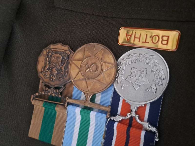 Vintage military medals and clothing ect