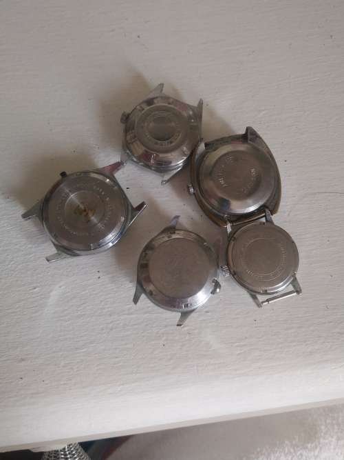 5  vintage mens watches and 9 straps