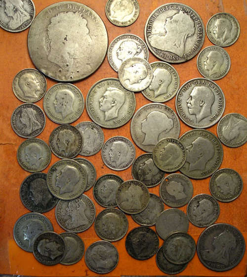 Collection of Silver Coins from Great Britain (123 gm) and the World (83 gm)
