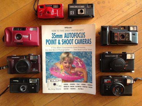 Collection of eight (8) 35mm point and shoot cameras (Late 80's early 90's)