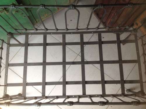 Vintage cast iron baby cot (on wheels) - Black