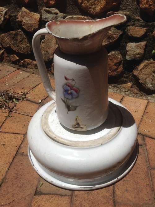 Vintage enamel water jug and basin