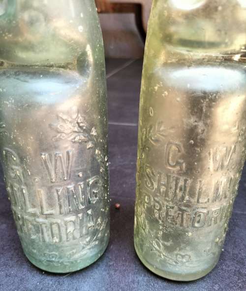 GW Shilling - Vintage Pretoria glass bottles (x2)