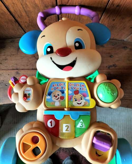 Vintage Fisher Price Baby walker / developmental toy - Like new