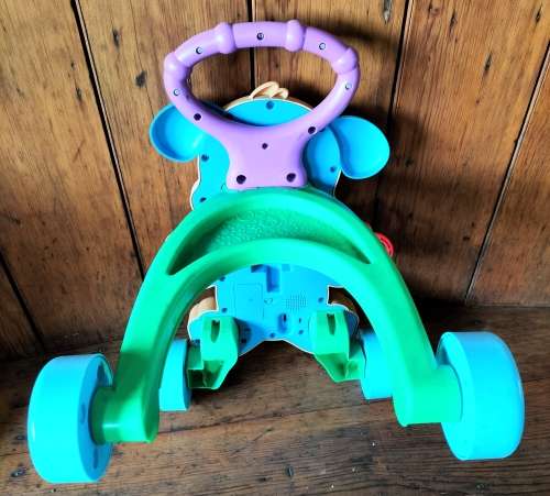 Vintage Fisher Price Baby walker / developmental toy - Like new