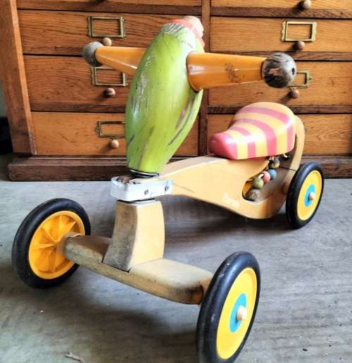 Little wooden toddler scooter