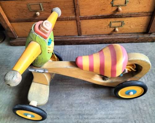 Little wooden toddler scooter