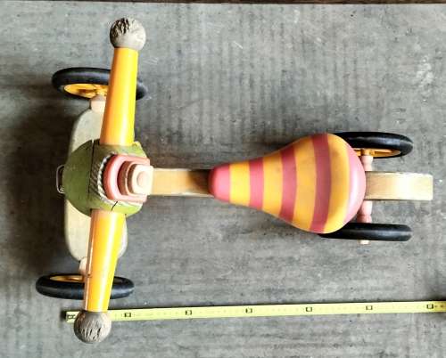 Little wooden toddler scooter