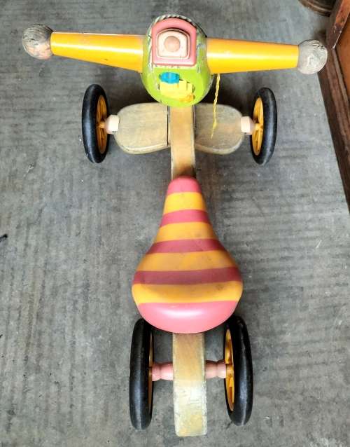 Little wooden toddler scooter