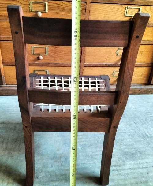 Sturdy vintage child/doll wooden riempies chair