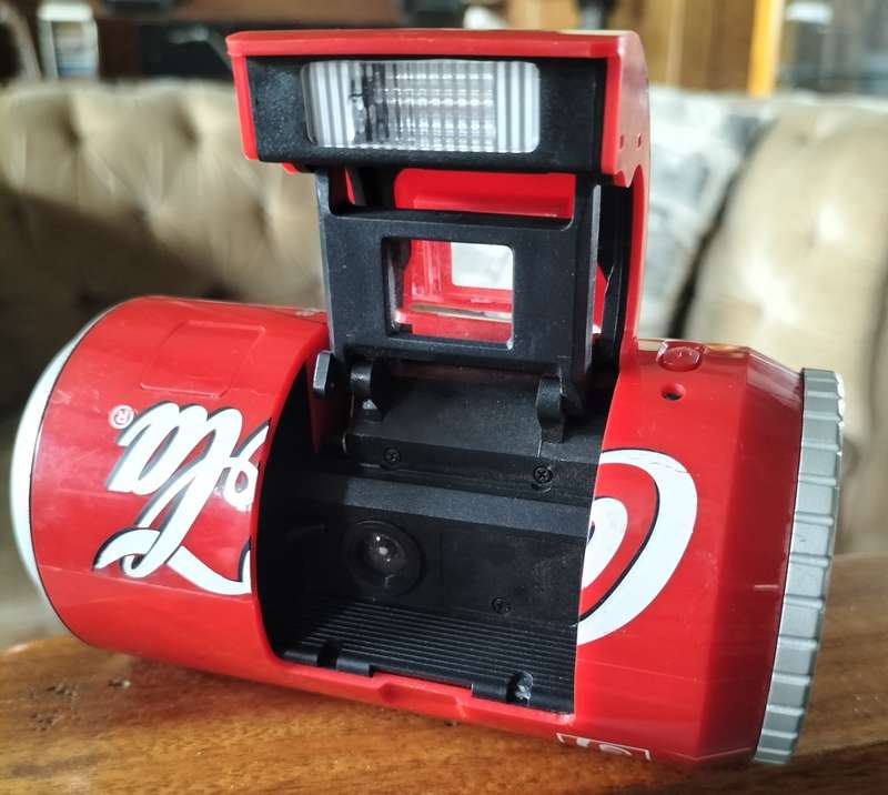 Vintage plastic camera in shape of Coca Cola can