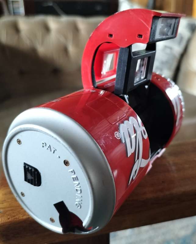 Vintage plastic camera in shape of Coca Cola can