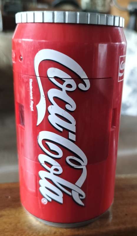 Vintage plastic camera in shape of Coca Cola can
