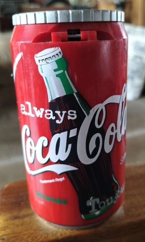 Vintage plastic camera in shape of Coca Cola can