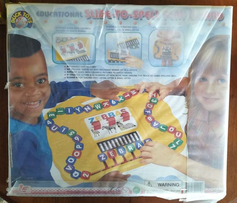Vintage Educational Slide to Spell board game