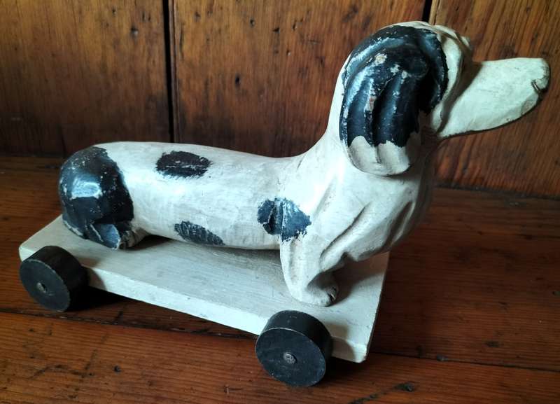 Vintage toy - Wooden pull along dog in wheels
