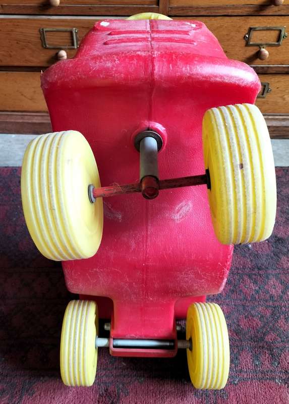 Vintage plastic push scooter