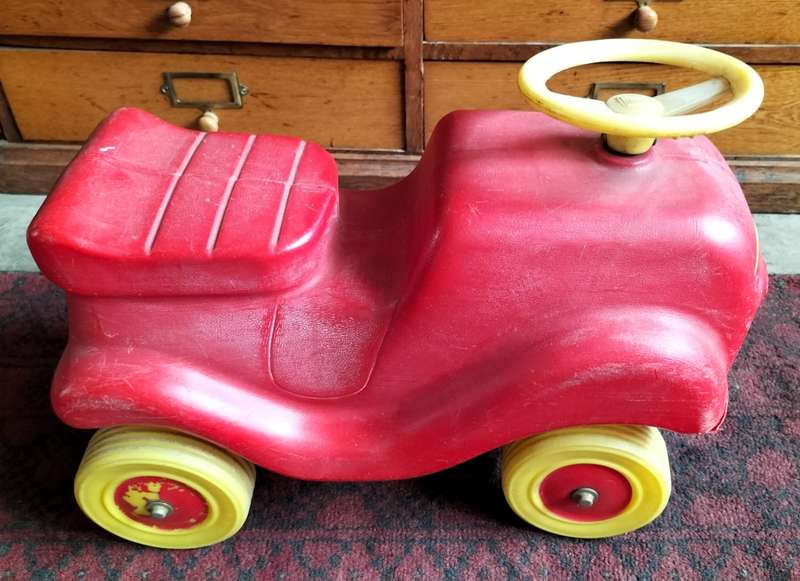 Vintage plastic push scooter