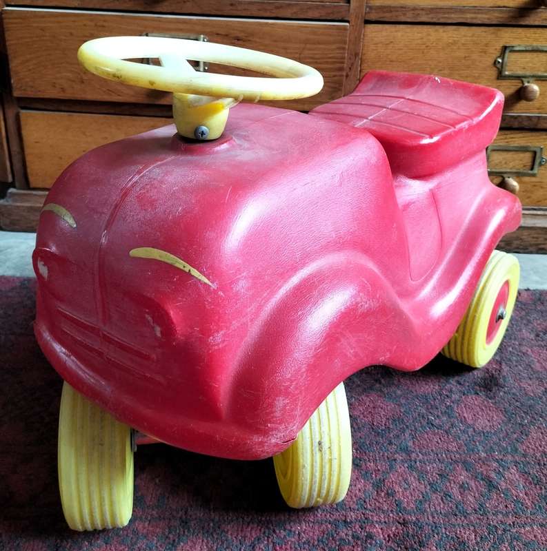 Vintage plastic push scooter