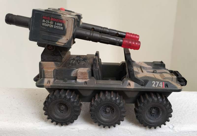 Vintage gun-mounted plastic Jeep