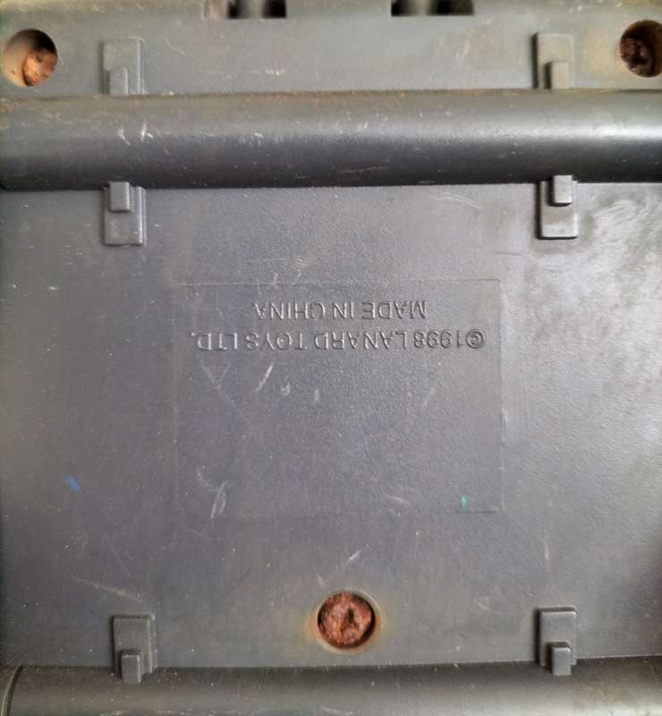 Vintage gun-mounted plastic Jeep