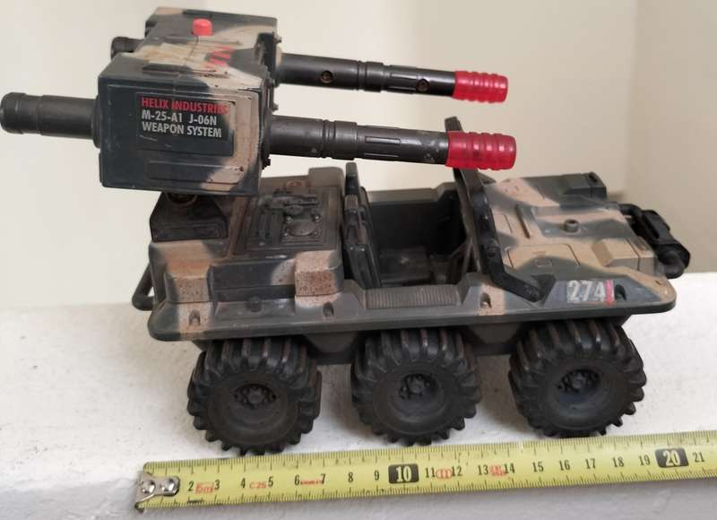 Vintage gun-mounted plastic Jeep