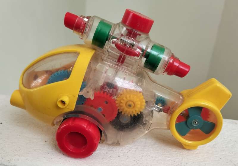 Vintage educational helicopter plastic toy