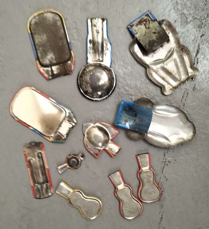 Vintage tin toy collection of whistles and clickers (x11)