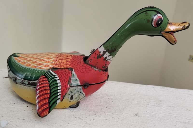 Vintage tin toy - duck on wheels