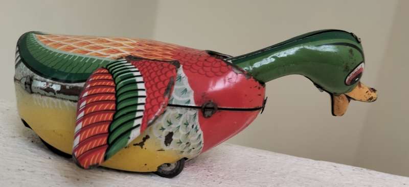 Vintage tin toy - duck on wheels