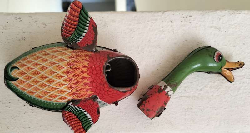 Vintage tin toy - duck on wheels