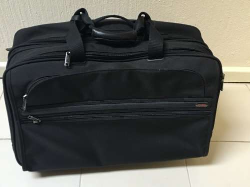TUMI overnighter bag/briefcase on wheels