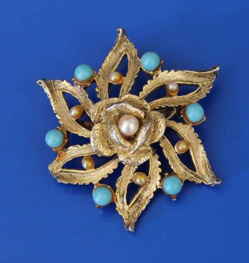 Vintage gold colour brooch with faux pearls and turquoise stones