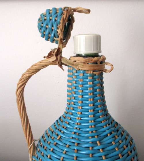 Vintage KWV Cologne 24 Wine Bottle covered with Vinyl Wicker.  Stunning Piece.