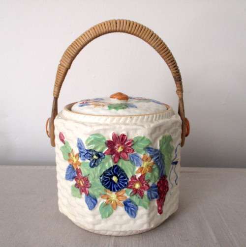 Vintage Floral basket Cookie Jar with Wicker handle. Made in Japan.