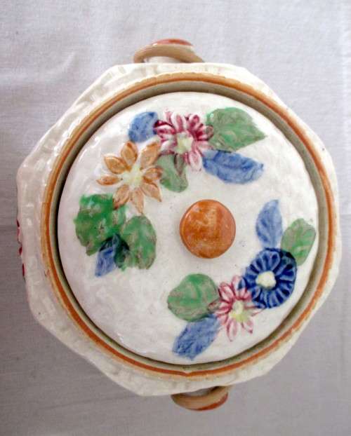 Vintage Floral basket Cookie Jar with Wicker handle. Made in Japan.