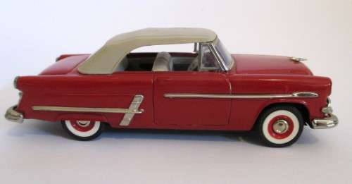 1953 Red Ford Sunliner Hard Top. Scale 1/43. Collector`s Classics, still in Box.