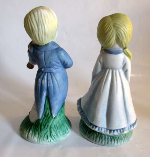 Two Lovely Unglazed Porcelain Figures. Musical Boy and Girl, Made in Taiwan. 15cm high.