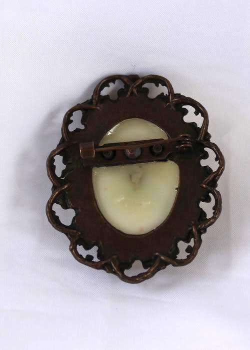 Vintage style floral brooch. Glass dome set in antique bronze setting