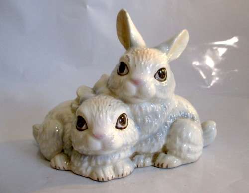 Vintage W. Germany Goebel Bunnies Figurine. Please note chip on ear and glaze scratches as per photo