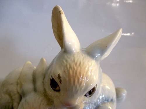 Vintage W. Germany Goebel Bunnies Figurine. Please note chip on ear and glaze scratches as per photo
