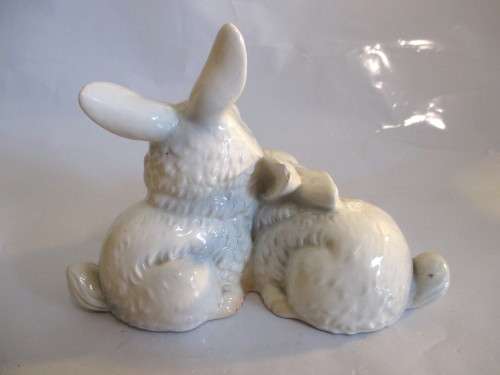 Vintage W. Germany Goebel Bunnies Figurine. Please note chip on ear and glaze scratches as per photo