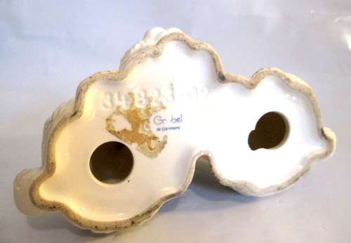 Vintage W. Germany Goebel Bunnies Figurine. Please note chip on ear and glaze scratches as per photo