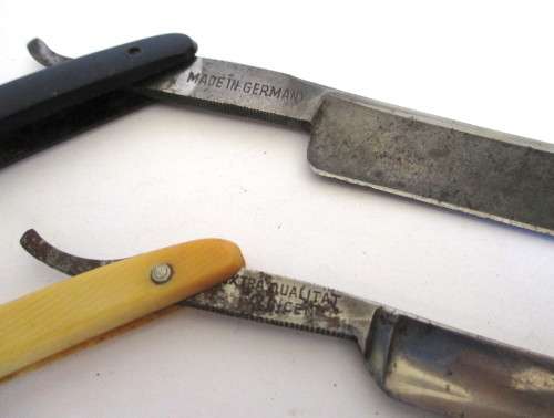 TWO ANTIQUE STRAIGHT CUT THROAT RAZORS. SOLINGEN - CARL SCHLIEPER AND BISMARCK.